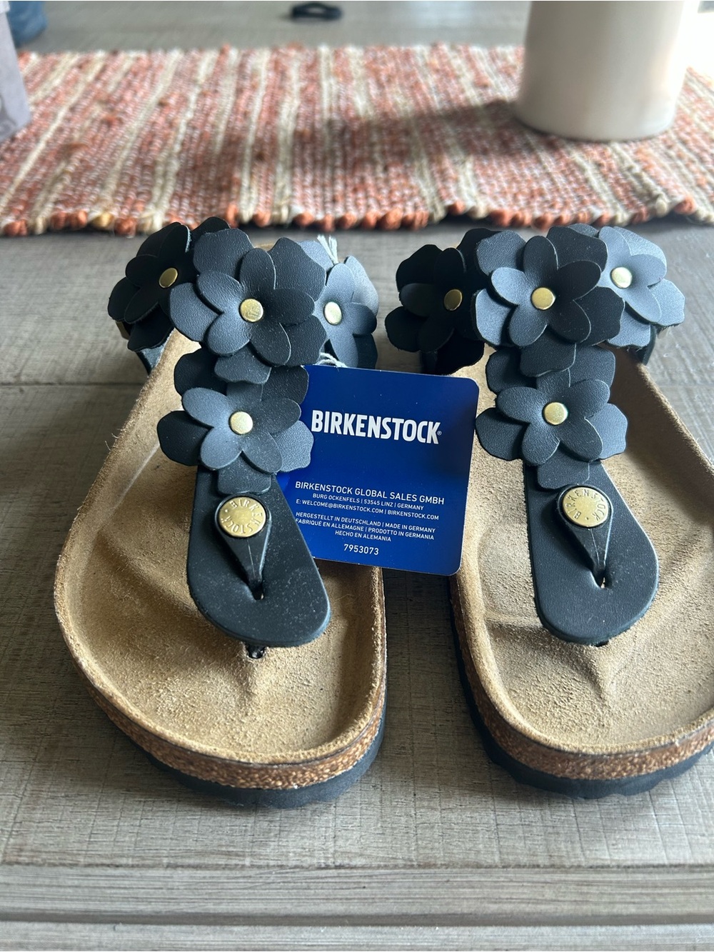 Birkenstock Black Gizeh Flowers Sandals with Gold Accents